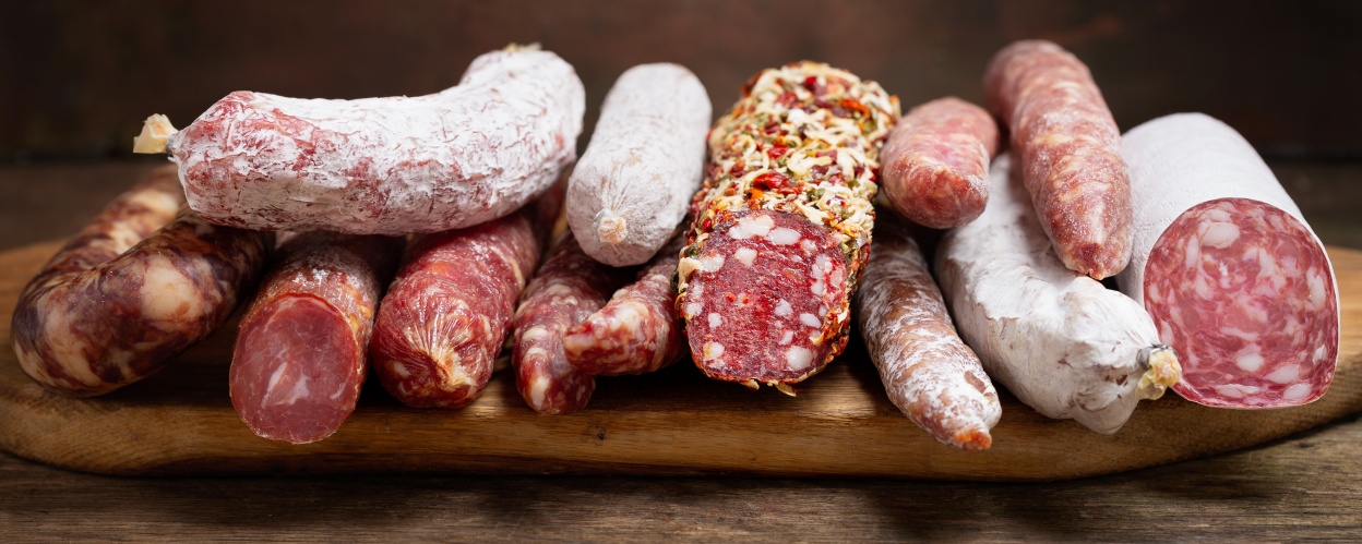 Various sausages, stacked